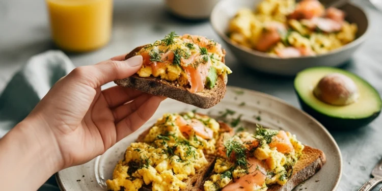 Healthy 30-minute scrambled eggs with smoked salmon and avocado toast – a protein-packed breakfast or brunch.