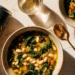 30-minute white bean and kale soup in a bowl, warm and hearty with greens and beans, perfect for a quick healthy meal.