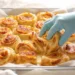 One-pan pizza rolls filled with cheese and toppings, golden and baked together in a skillet.