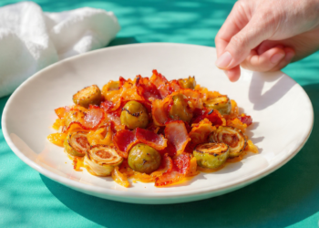 One-pan Italian sausage with bell peppers and onions, lightly caramelized and served from the skillet.