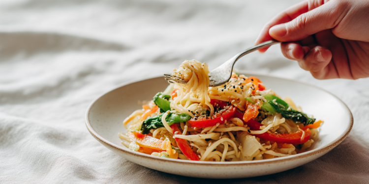 Sesame noodles with vegetables in a quick vegetarian noodle bowl, simple and flavorful.