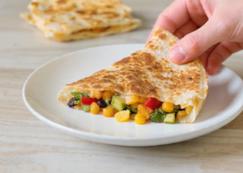 Vegetarian quesadillas with five different fillings, golden and crispy, served hot from the pan.