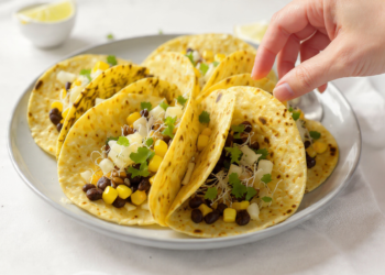 Vegetarian tacos with black beans and corn, colorful, fresh, and quick to prepare.