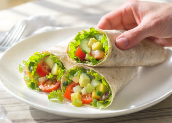 Quick vegetarian wraps with fresh vegetables and spreads, perfect for an easy lunch on the go.