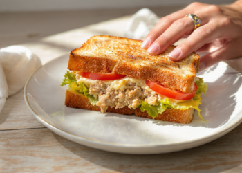 Budget tuna melt sandwich with melted cheese, canned tuna, and toasted bread for quick easy meals