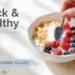 Customizable healthy breakfast bowl with granola, yogurt, berries, and toppings on white background
