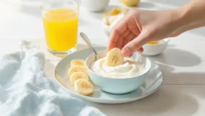 Healthy breakfast for kids with fruit kabobs, pancakes, yogurt parfaits and egg muffins on colorful plate