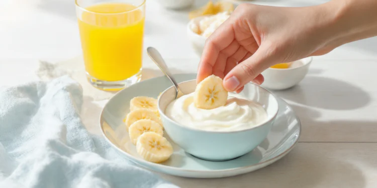 Healthy breakfast for kids with fruit kabobs, pancakes, yogurt parfaits and egg muffins on colorful plate