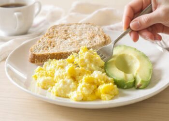 Easy to chew breakfast for seniors with oatmeal, eggs, yogurt, and soft fruits