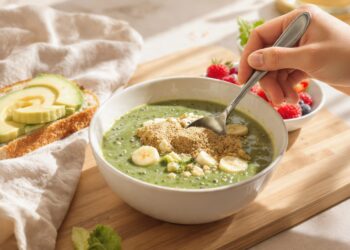 Quick healthy breakfast bowl with superfoods: blueberries, chia seeds, banana, and honey on Greek yogurt