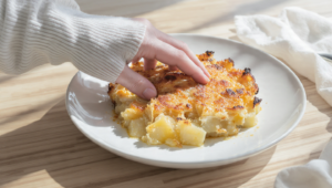 Potato and Gruyère gratin, creamy vegetarian bake with a golden, cheesy top.