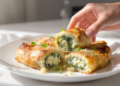 Vegetarian pizza rolls with spinach and ricotta filling, golden, cheesy, and quick to make.
