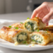 Vegetarian pizza rolls with spinach and ricotta filling, golden, cheesy, and quick to make.