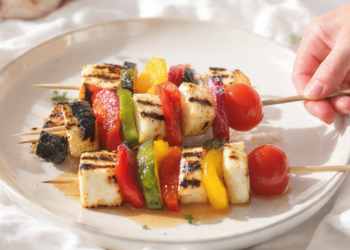 Grilled halloumi and vegetable skewers, quick vegetarian dish with golden cheese and veggies.