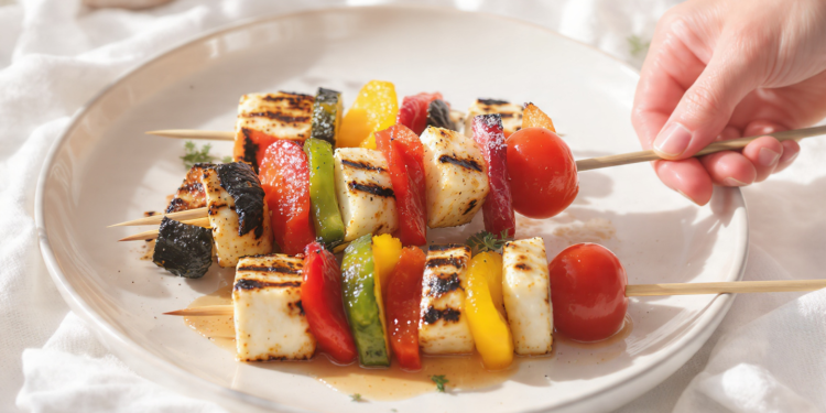 Grilled halloumi and vegetable skewers, quick vegetarian dish with golden cheese and veggies.