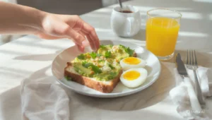 Quick healthy breakfast for energy boost with fruits, eggs, and whole grains on a bright kitchen table
